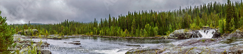 Photos Lapland wilderness river flowing through rocky boreal forest