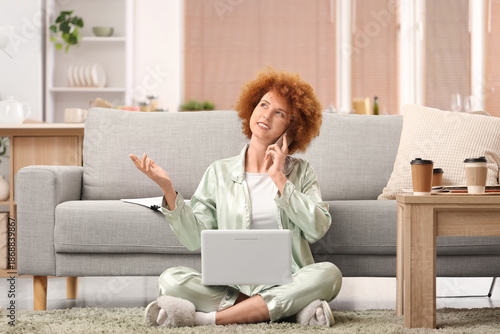 Redhead female freelancer w...