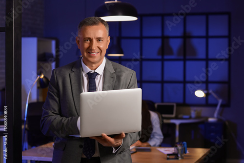 Male business analyst worki...