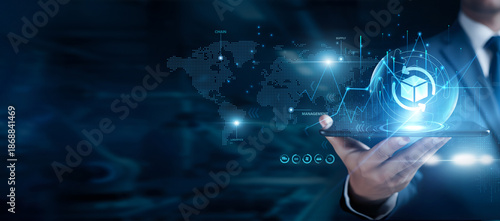 Businessman using the tab and analyzing SCM data, supply chain management, logistics optimization, inventory control, procurement analytics