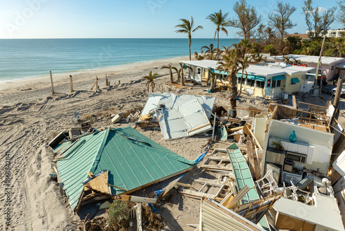 Wallpaper Mural Ruined buildings in need of demolition or repair. Storm surge water and wind damaged houses roof and collapsed walls after hurricane in Florida Torontodigital.ca