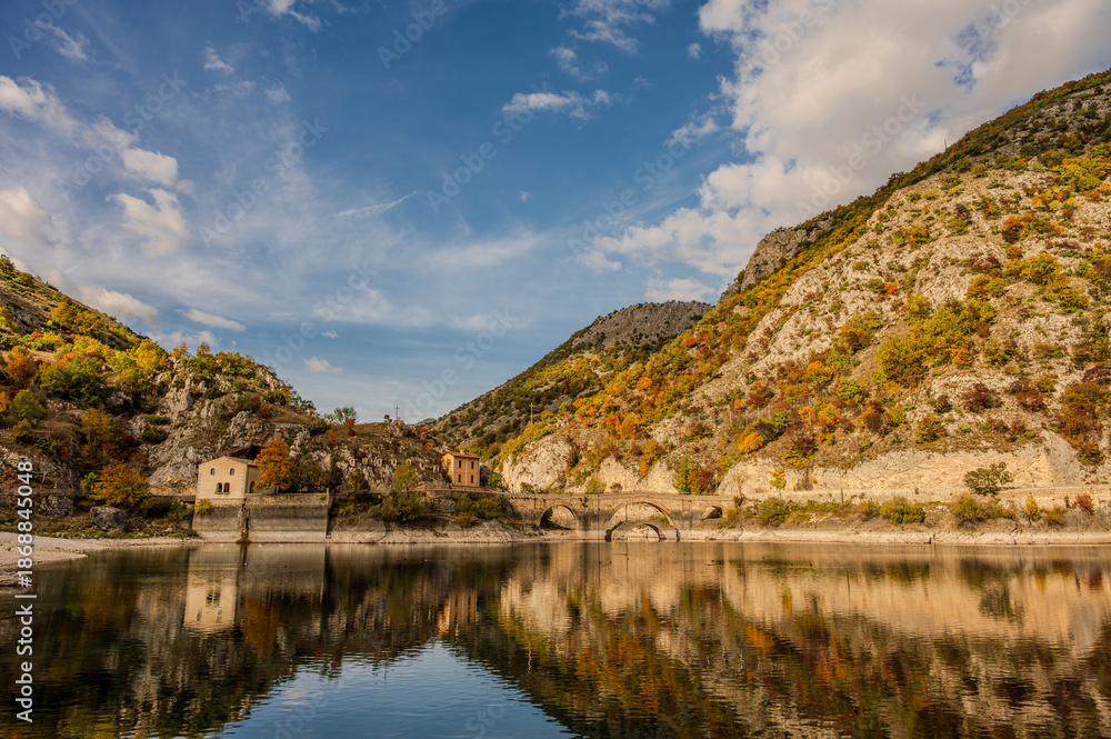 Fototapeta premium Lake San Domenico is an artificial lake in Abruzzo, in the municipality of Villalago (L'Aquila). Known for its emerald waters, it is located within the Sagittario Gorges.