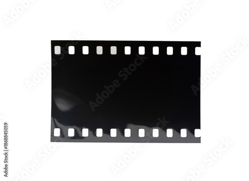Piece of dark unexposed slide film on transparent png background.