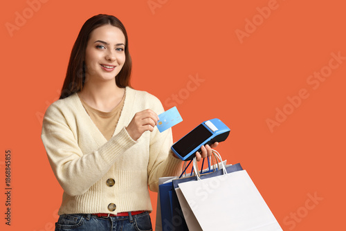 Young woman with payment te...