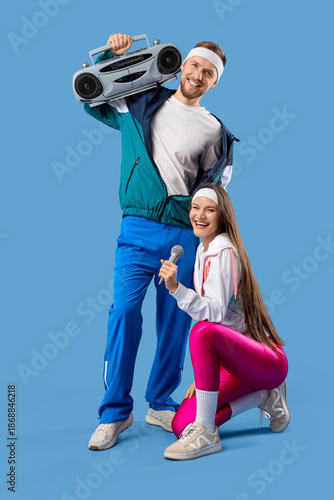 Young couple with boombox a...