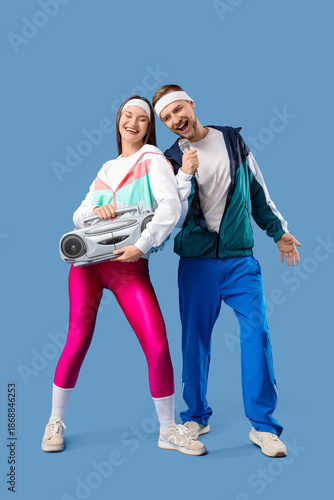 Young couple with boombox a...