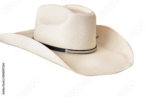 Bilde på lerret Cowboy-style straw hat with black ribbon isolated on a white background; straw hat for head protection for both men and women