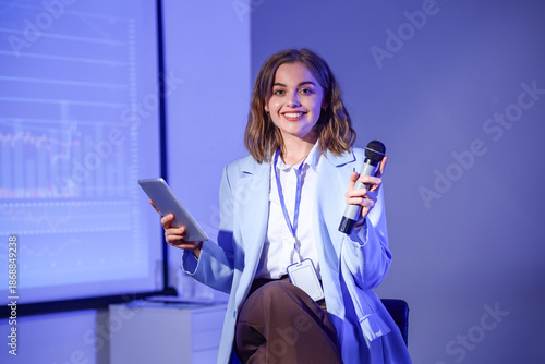 Young businesswoman giving ...