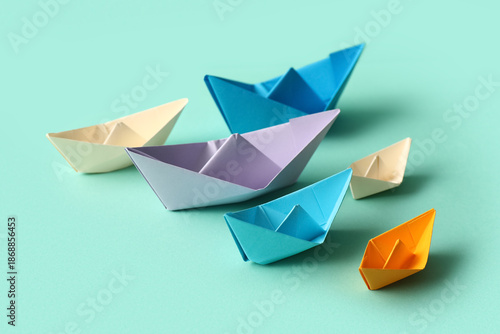 Wallpaper Mural Colorful paper boats on turquoise background Torontodigital.ca
