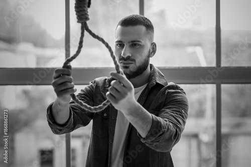 Young man going to hang him...