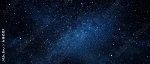 Night sky abstract image featuring numerous stars against a dark blue background