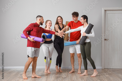 Group of sporty people with...