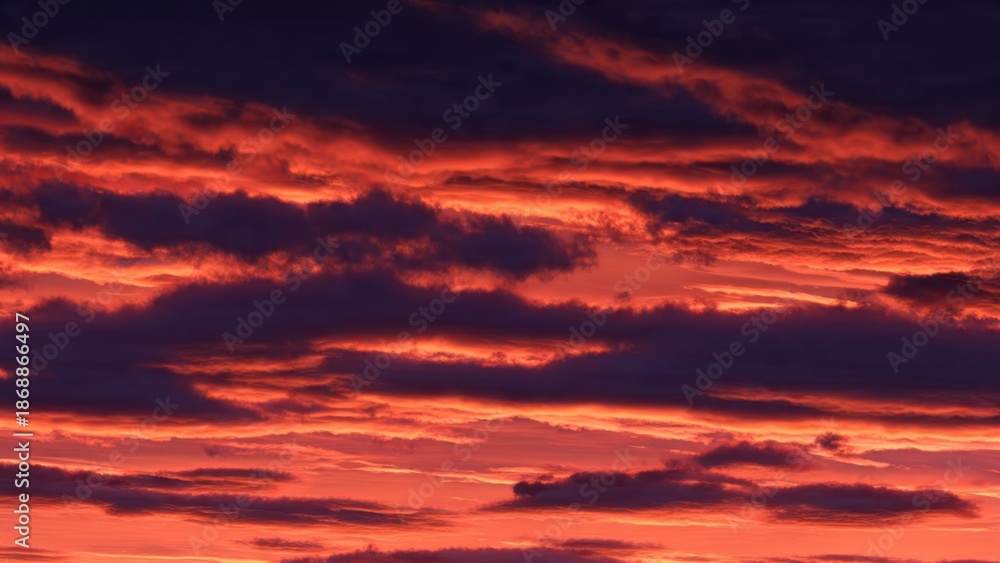 Obraz premium Fiery Sunset Clouds