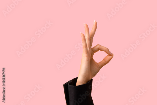 Hand of young businesswoman...