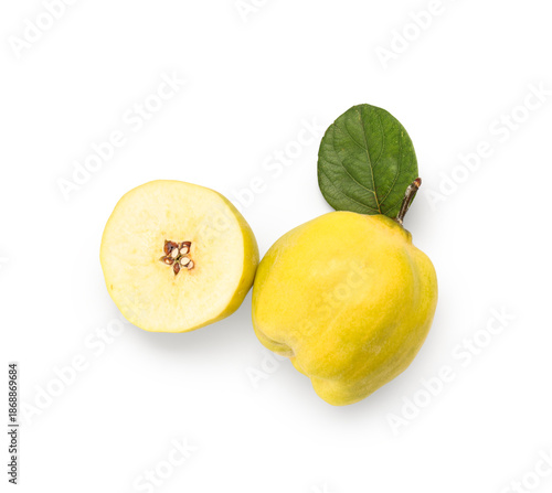 Vászonkép Fresh quince with cut piece and leaf on white background