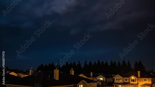 Dramatic Lightning Storm Illuminates Residential Neighborhood at Night.