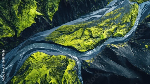 A vibrant green mossy landscape covering black volcanic rock in Iceland, a glacial river winding through the scene, dramatic contrast, professional drone photography, ultra sharp. 