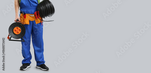 Male electrician with exten...