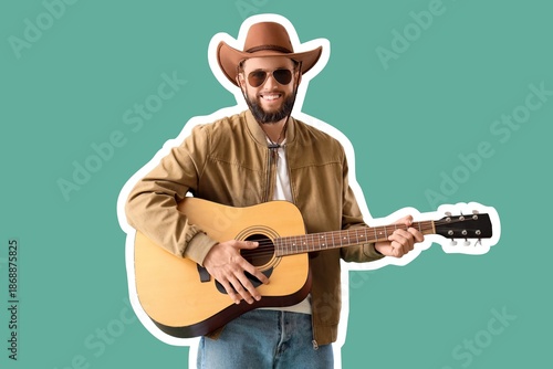 Handsome cowboy playing gui...