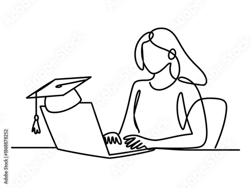 A woman with a graduation cap sitting at a laptop, symbolizing online education and learning.
