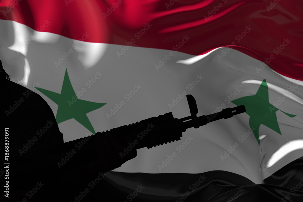 Obraz premium Silhouette of an armed soldier with a machine gun against the background of the Syrian flag.