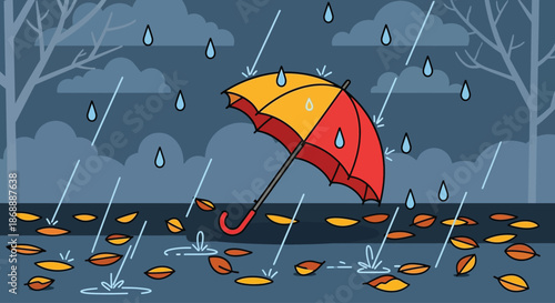 A colorful red and yellow umbrella lying on the ground in the rain.