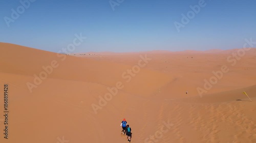 Sahara Desert Sand Dunes Erg Chebbi Merzouga Morocco Africa Camels Animal Caravan Vast Arid Landscape Nature Running Trail Endurance Sports Warm Outdoor Activities Adventure Travel Scenic Wilderness