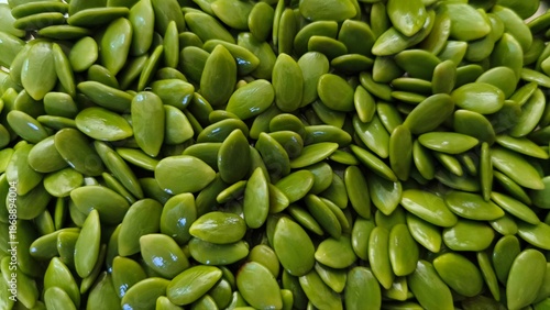 pile of fresh raw green vegetable grains. Leucaena seeds (1)