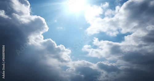 Dramatic storm clouds clearing to bright sunshine