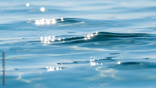 Sparkling Cerulean Water Ripples with Sun Glare - Abstract Blue Sea Surface Background