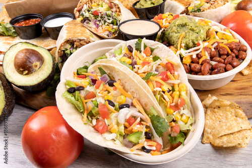 A selection of Mexican fast food including burritos and tacos