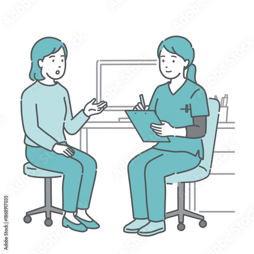 問診をする女性医師と女性患者（スクラブ・医療従事者）