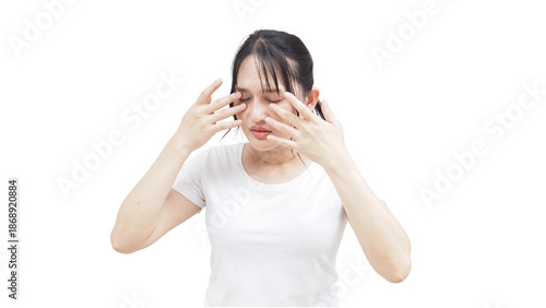 Bilde på lerret Young Asian woman rubbing both eyes with her hands due to severe eye strain, fatigue, or dry eyes