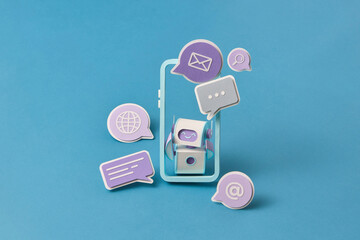 Papercraft robot with floating communication icons