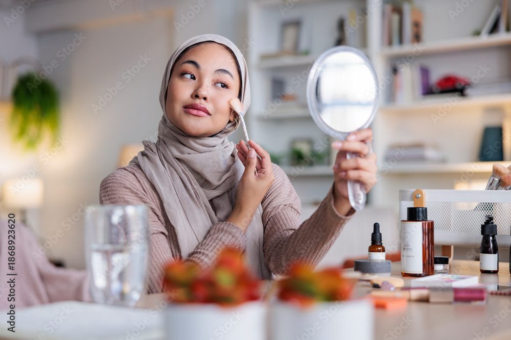 © Jovo Jovanovic/Stocksy - Woman testing new makeup