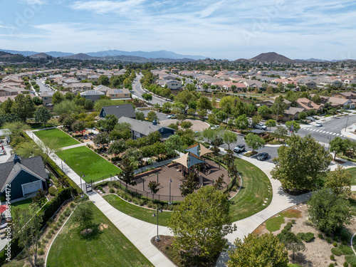 Aerial view of a sprawling neighborhood of family homes in Menifee city in Riverside County, California, United States