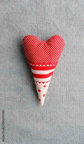 Handmade red spotted and striped heart shape cushion