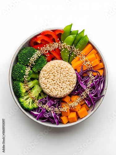 Vibrant vegan buddha bowl with rice and assorted fresh vegetables