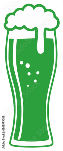 Green beer with overflowing foamy head and bubbles in a tall glass for Saint Patrick's Day celebrations