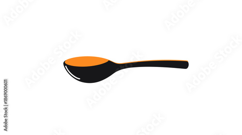 Black Spoon with Orange Liquid Inside.