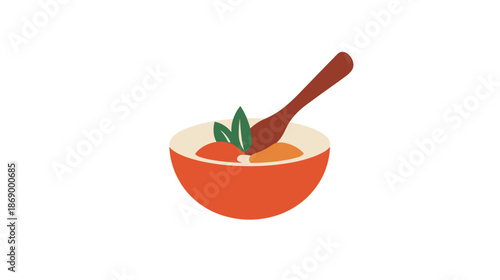 Bowl of Soup with Spoon and Garnish.