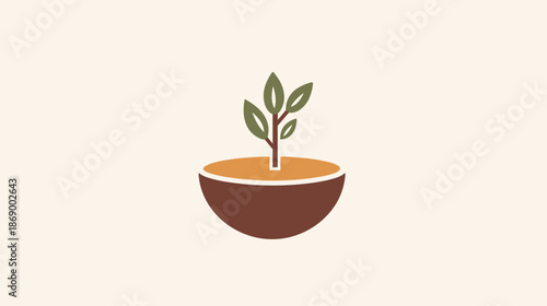 Small Green Plant Growing in Pot.