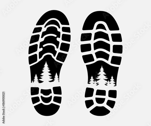 Footprints in the forest with trees reflected in the soles