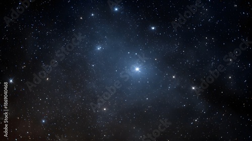 A luminous star cluster shines brightly in the deep dark expanse of the night sky