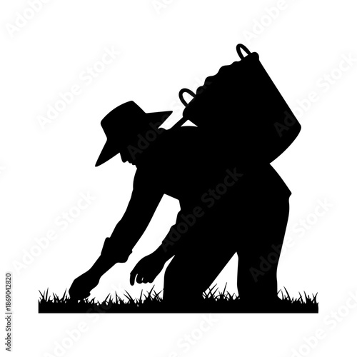 Silhouette of Farmer Harvesting Crops in Agricultural Field Landscape.