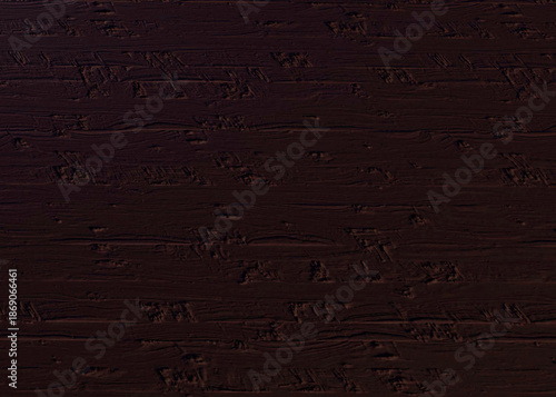 Close-up of a Dark Brown Rough Textured Stucco Wall Surface for Background