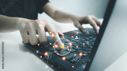 User using a laptop with AI technology, finger pointing at the device. Digital technology icons appear as a connected diagram, representing network, data, ideas, email
