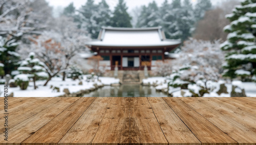 Rustic wooden table with a blurred japanese winter garden background