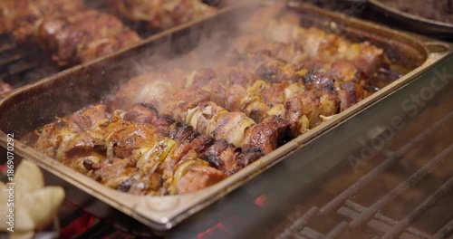 Wallpaper Mural Grilling food on the coals at the New Year's Christmas market - shashlik and homemade sausage Torontodigital.ca