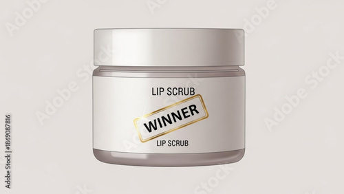A white jar of lip scrub with a gold winner sticker on a plain background with skincare and beauty product and cosmetics and award with up